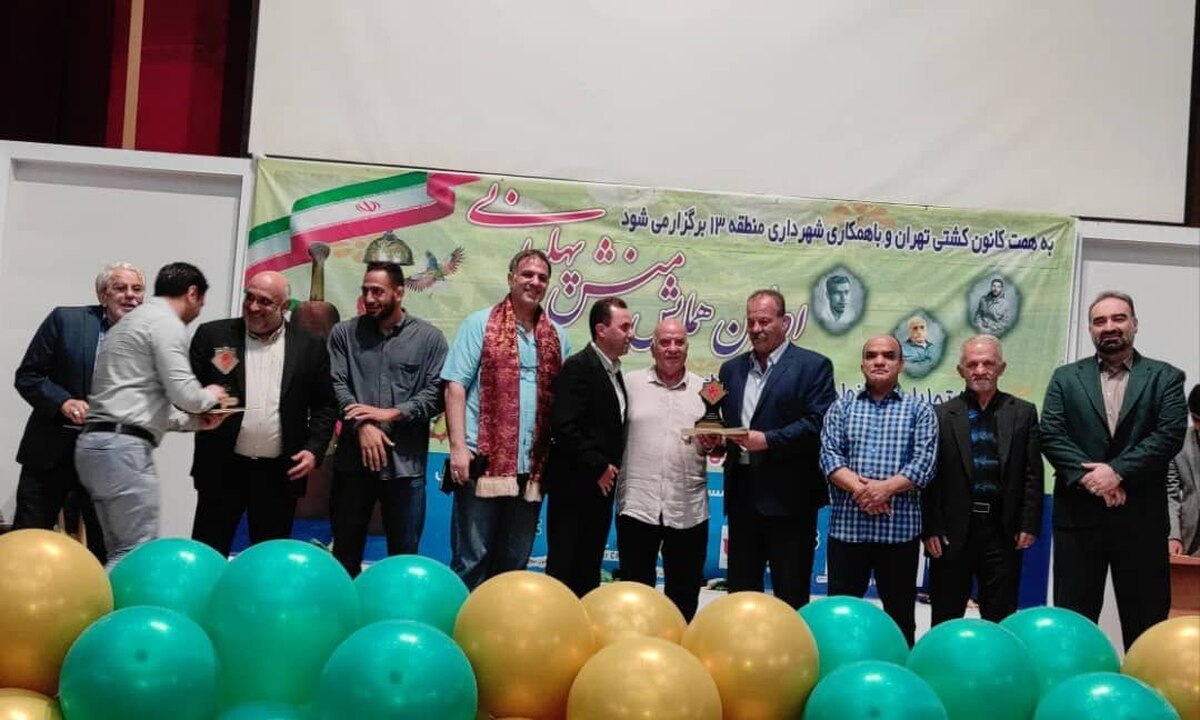 از خانواده‌های  شهدای کشتی‌گیر تجلیل شد